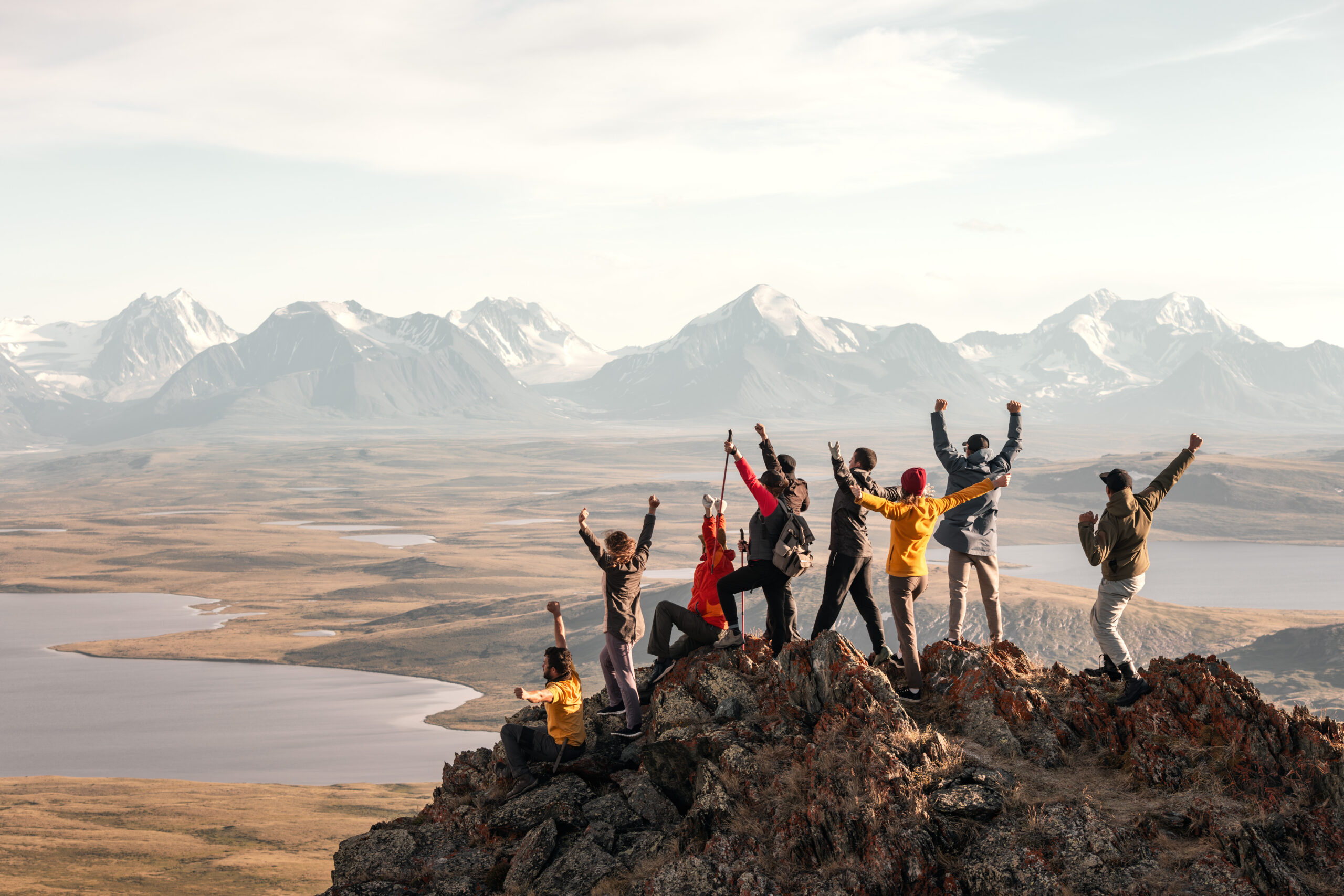 Large group of tourists people at mountain top